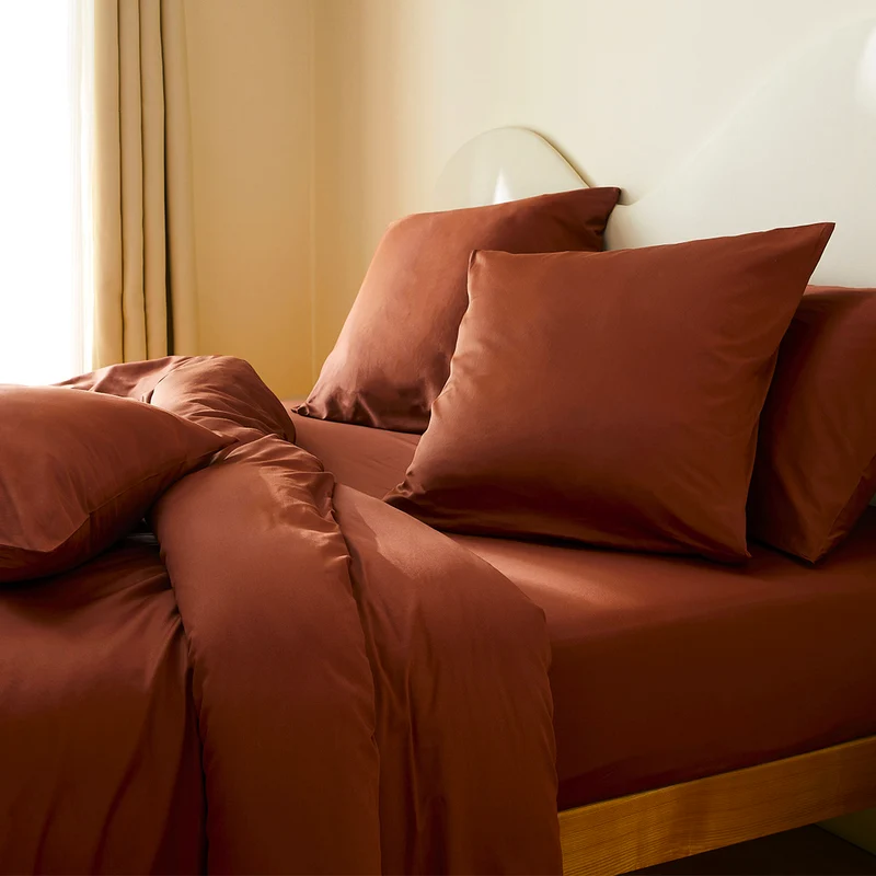 La taie d'oreiller en satin de coton bio