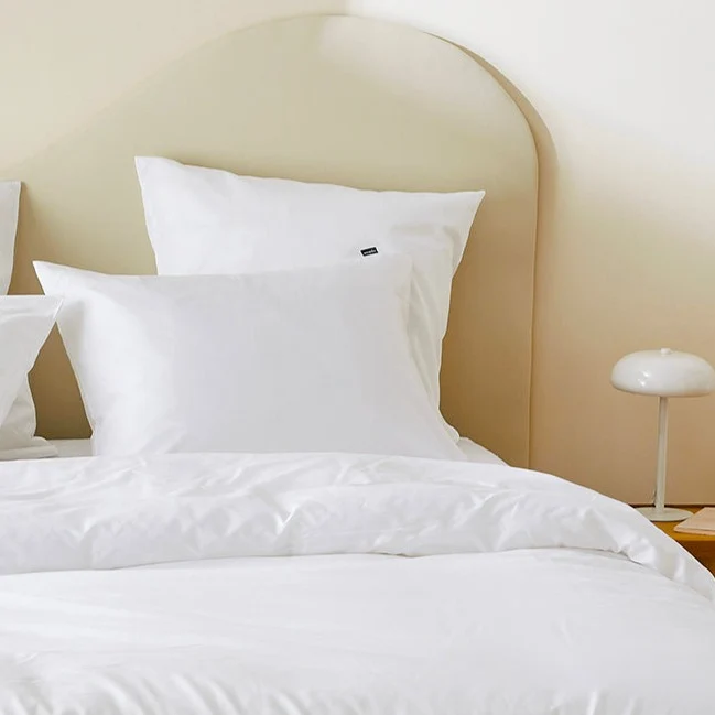La taie d'oreiller en satin de coton bio