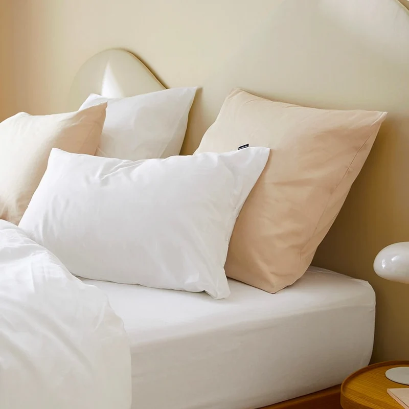 La taie d'oreiller en satin de coton bio