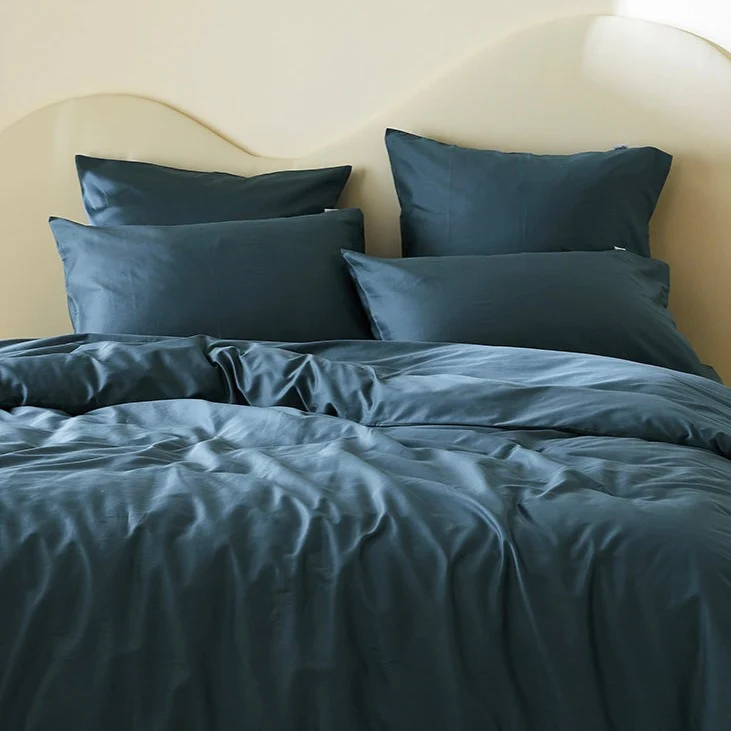 La taie d'oreiller en satin de coton bio