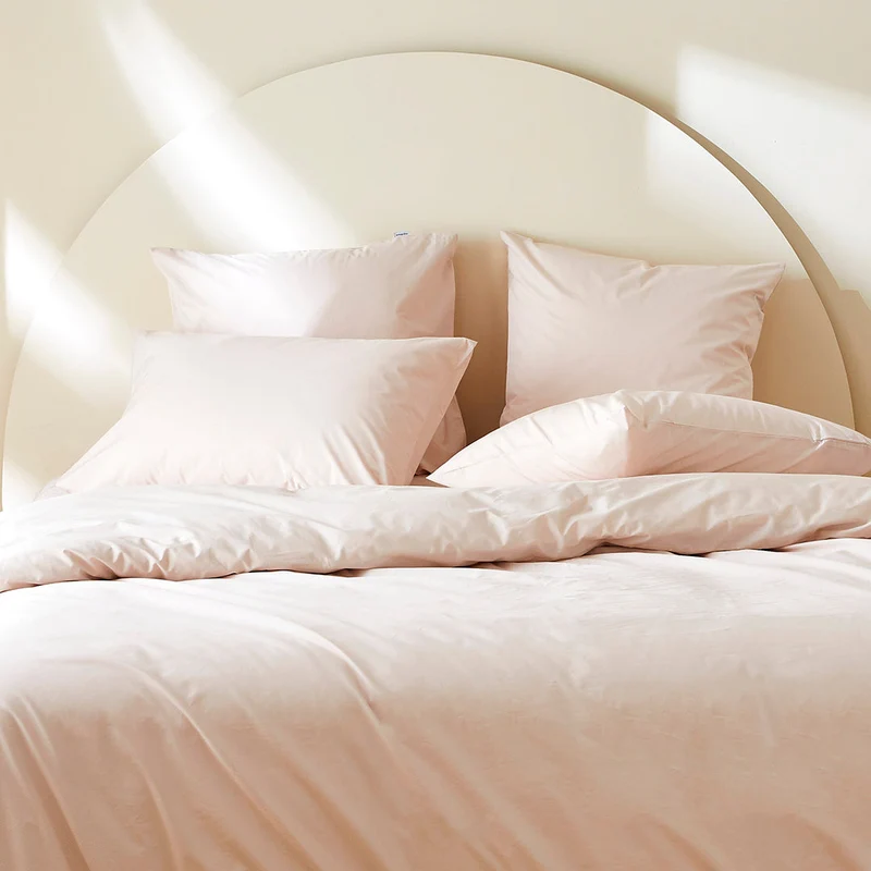 La taie d'oreiller en percale de coton bio