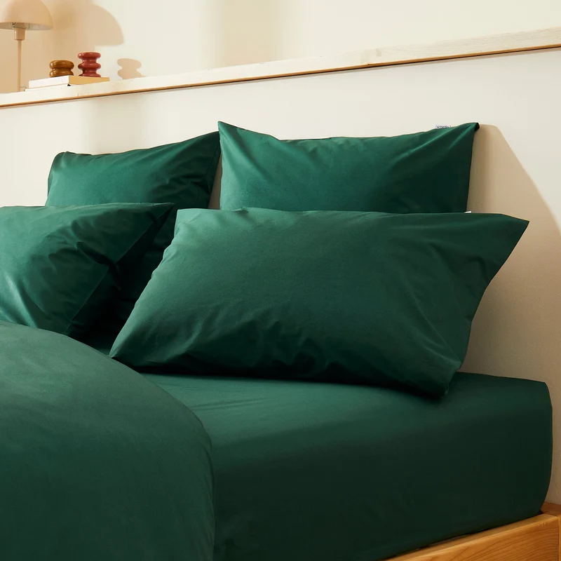 La taie d'oreiller en percale de coton bio