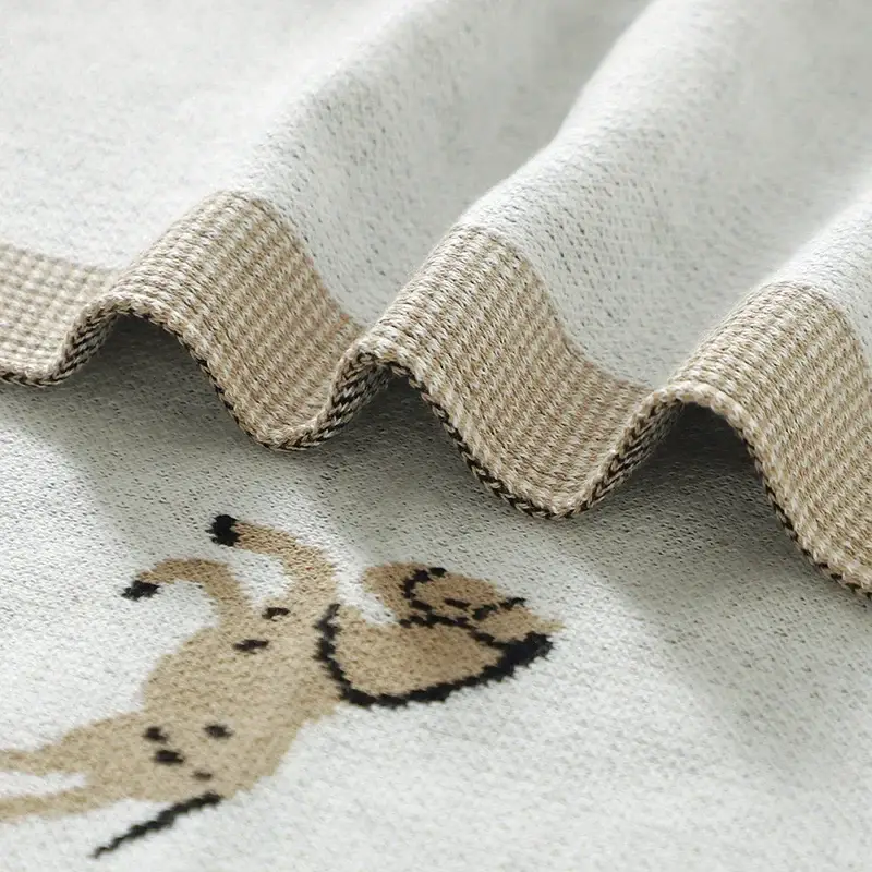 Couverture en Maille Bebe