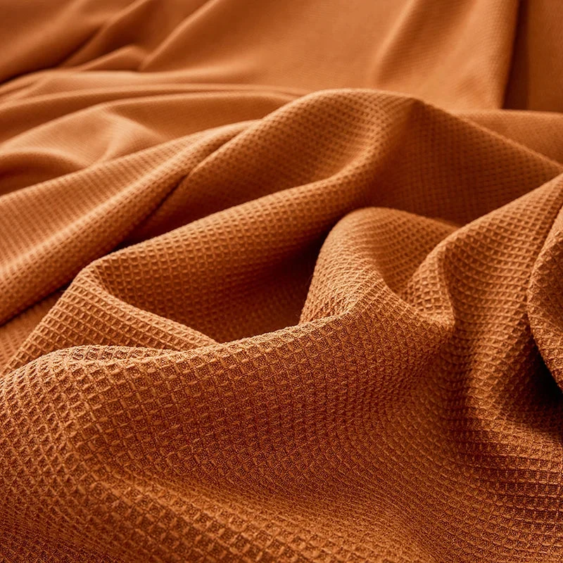 Jeté de canapé imperméable texture gaufrée