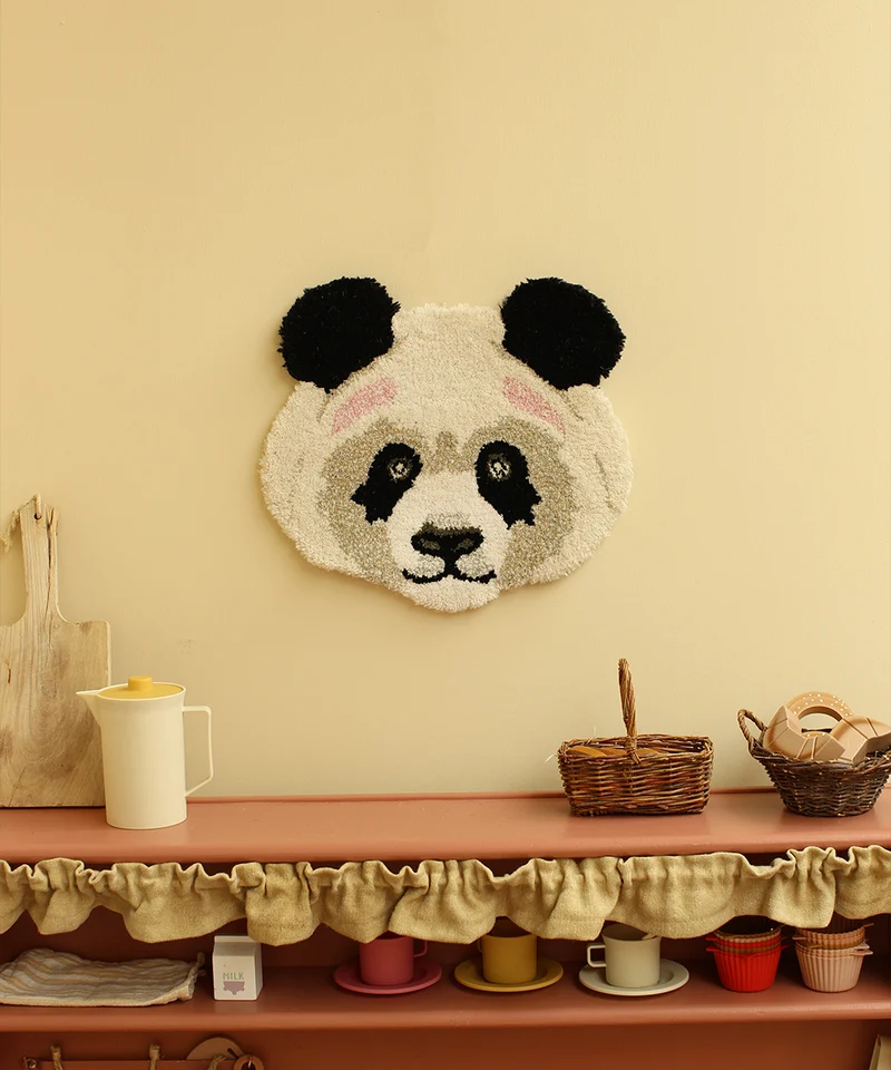 Pandahoved tæppe i uld – Doing Goods