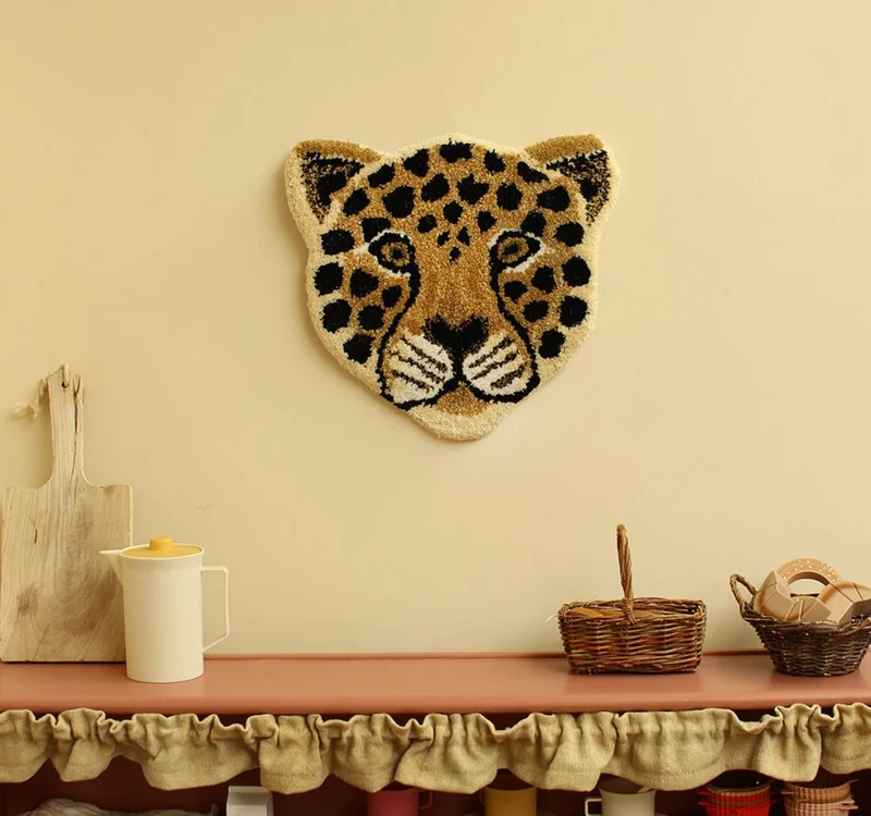Leopardhoved tæppe i uld – Doing Goods