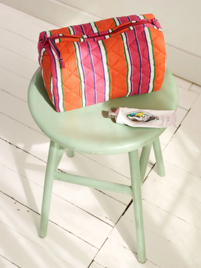 Trousse de toilette matelassée ronde